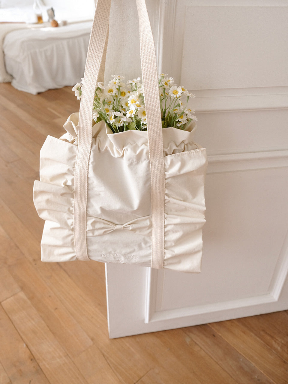 Ovuni Ruffle drawstring bag_ivory