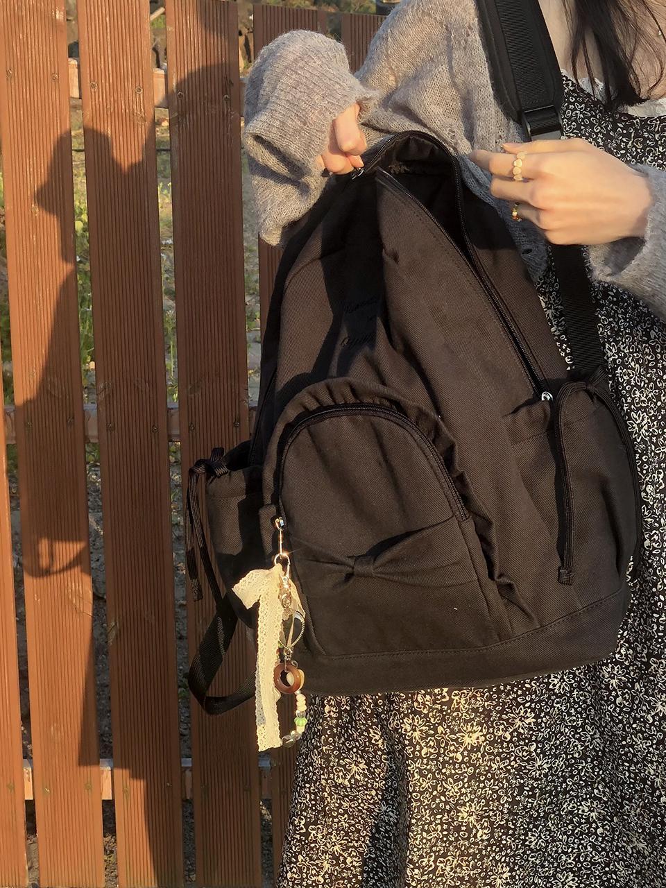 Ovuni Ruffle Ribbon Backpack_ Vintage Black