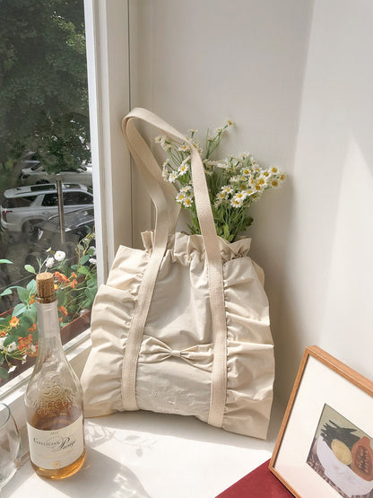 Ovuni Ruffle drawstring bag_ivory