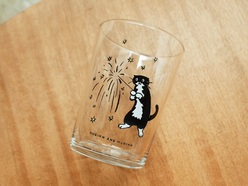 Huginn and Muninn [on the table] summer night glass